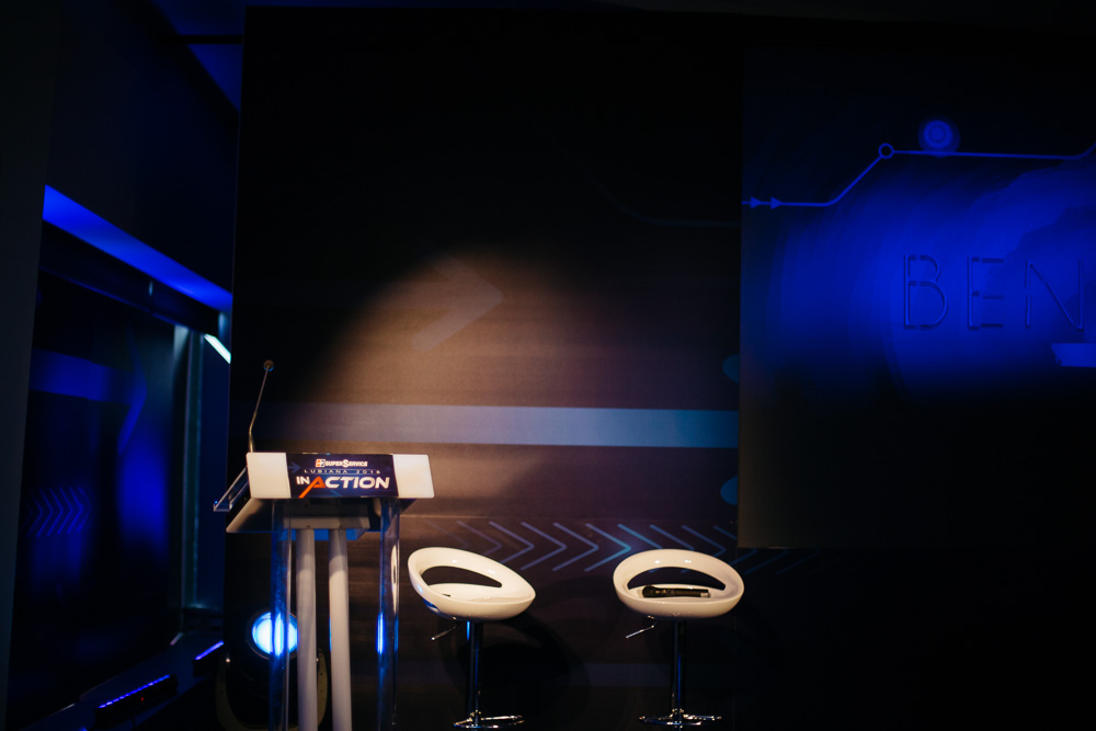 Conference stage with branded backdrop