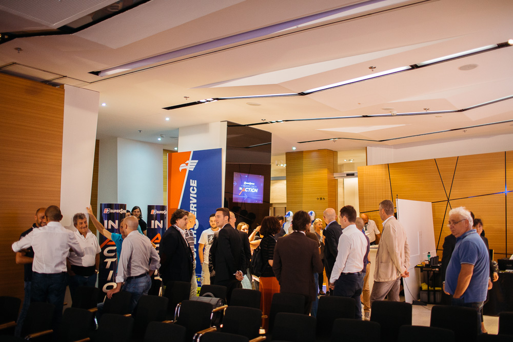 Delegates networking at conference